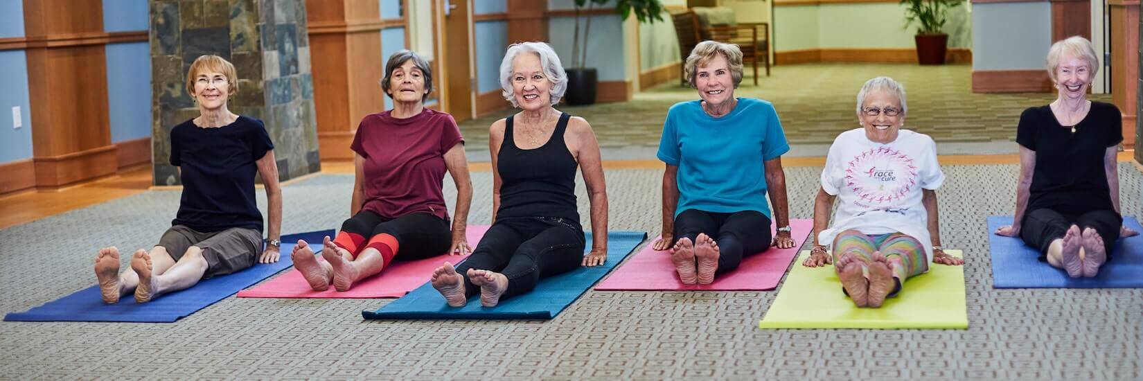 activities calendar, senior women doing yoga