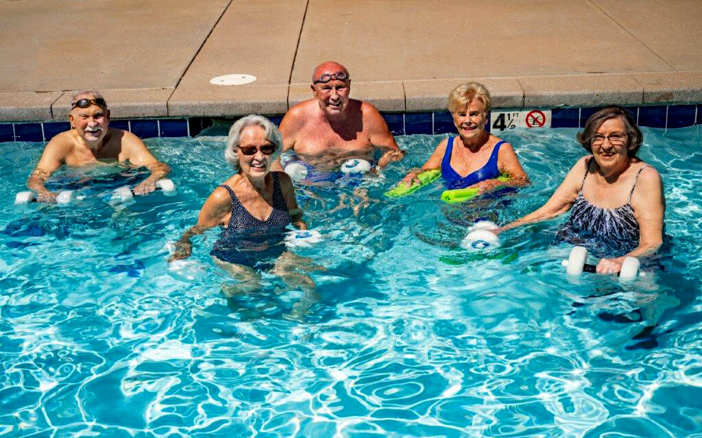 Seniors enjoying time in the swimming pool