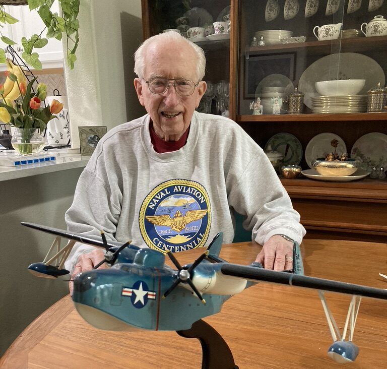 Detwiler with the first naval plane he served aboard – a PBM Mariner.