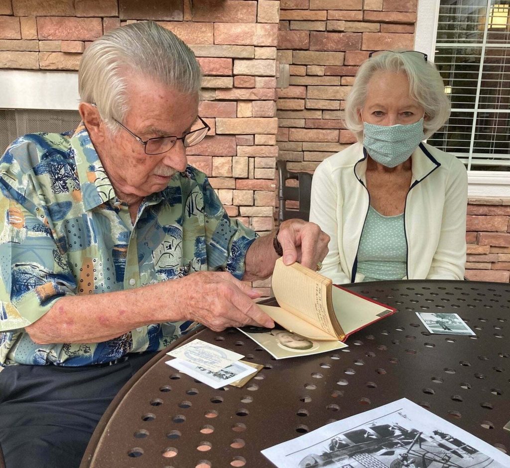 seniors looking through journals