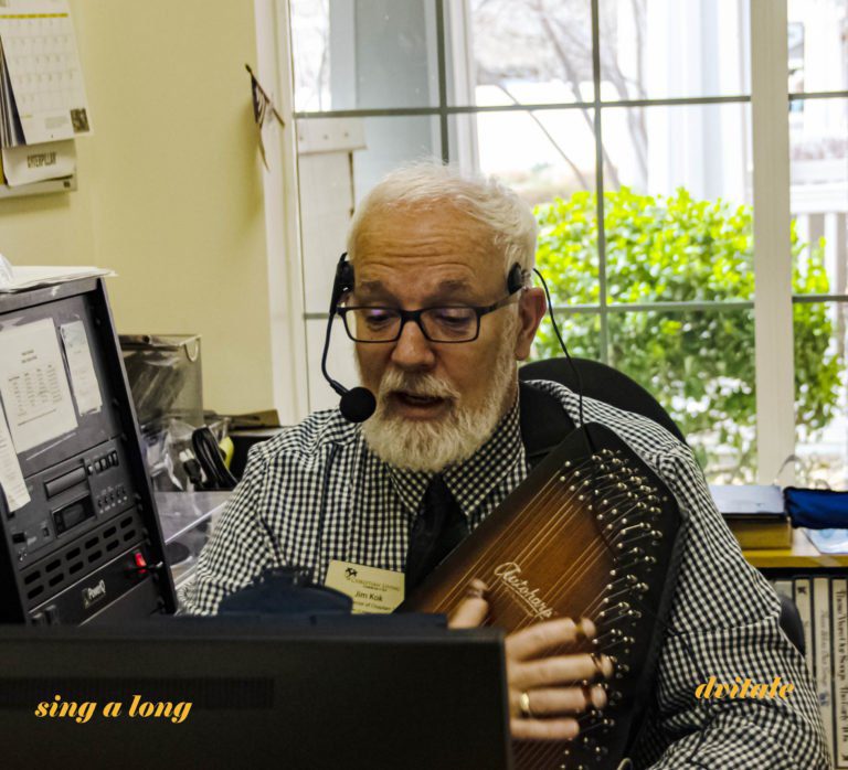 Chaplain Jim Kok leads sing-a-long from HCRK radio station.