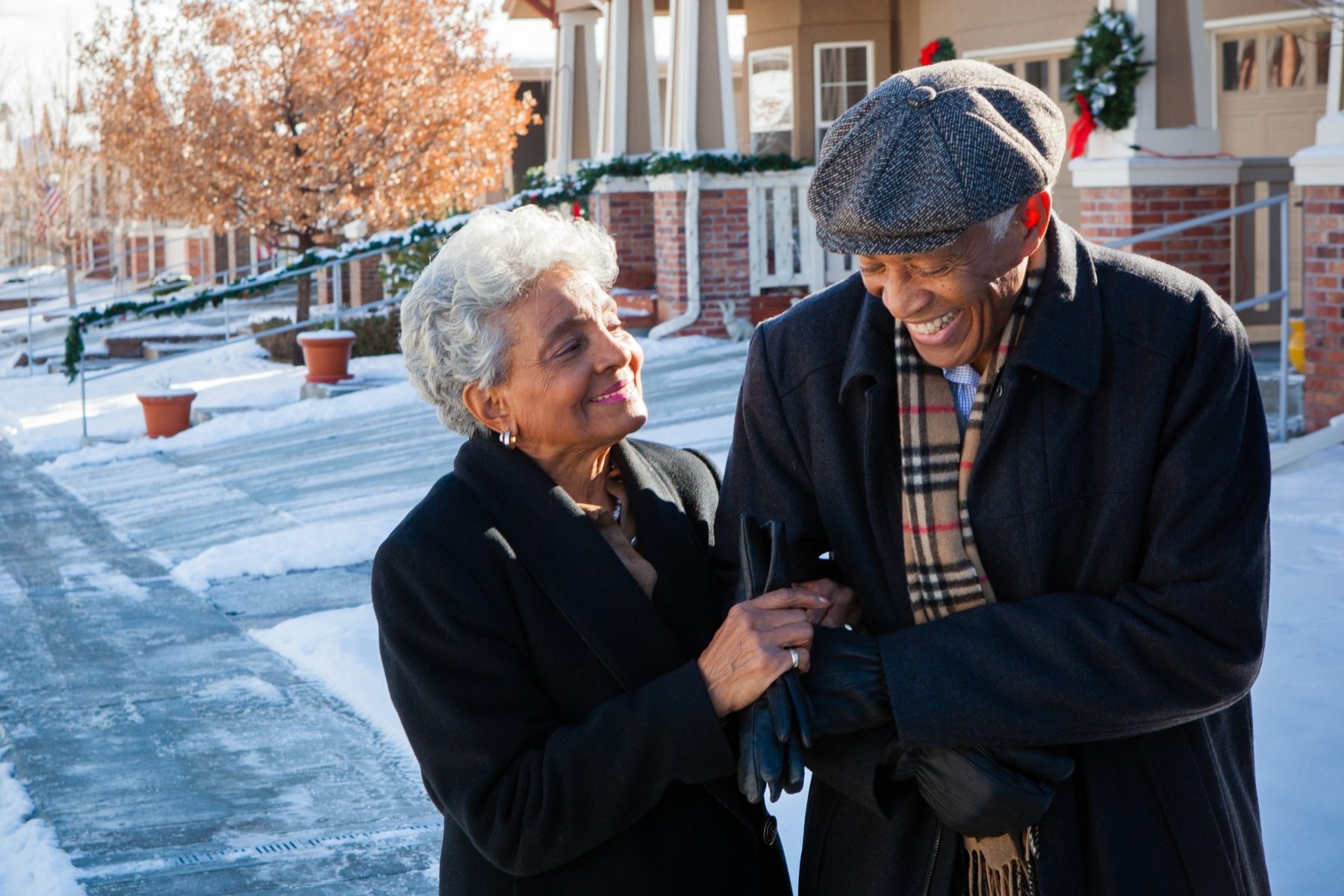 older couple laughing together landscape