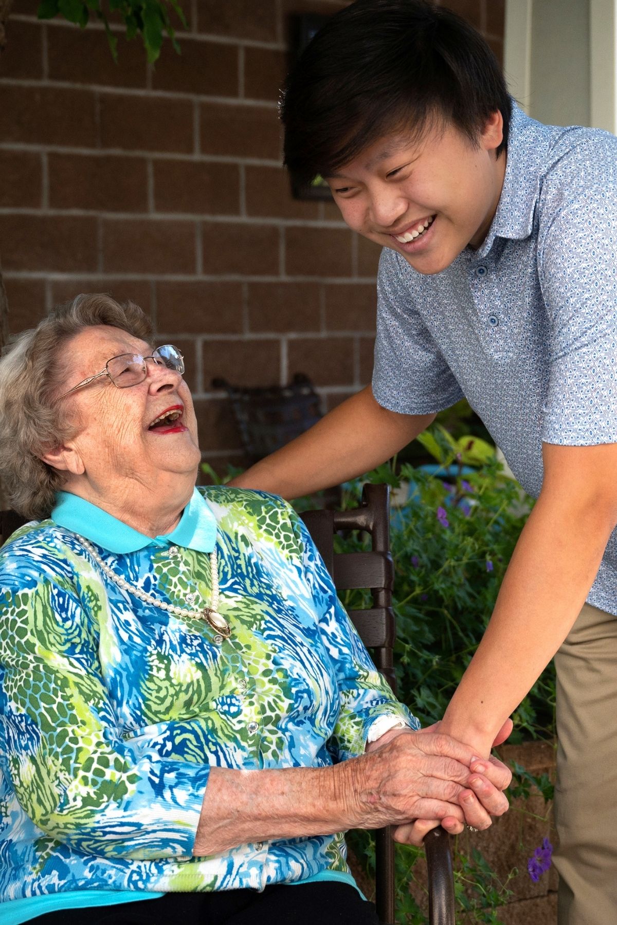 resident and visitor laughing portrait