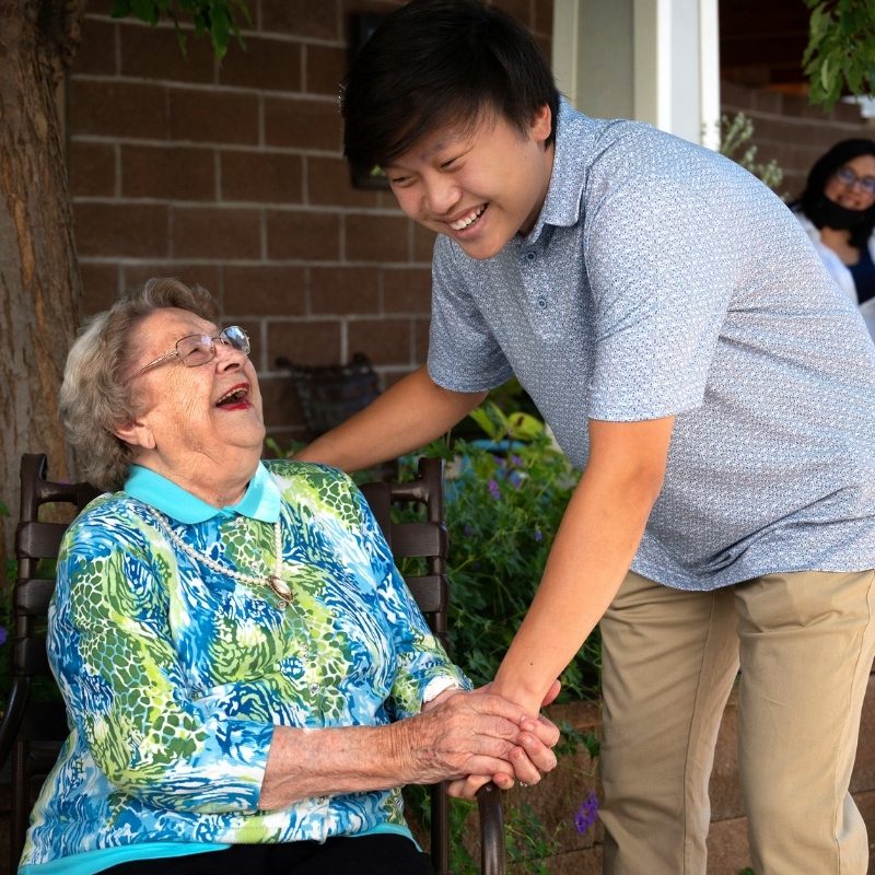 resident and visitor laughing square