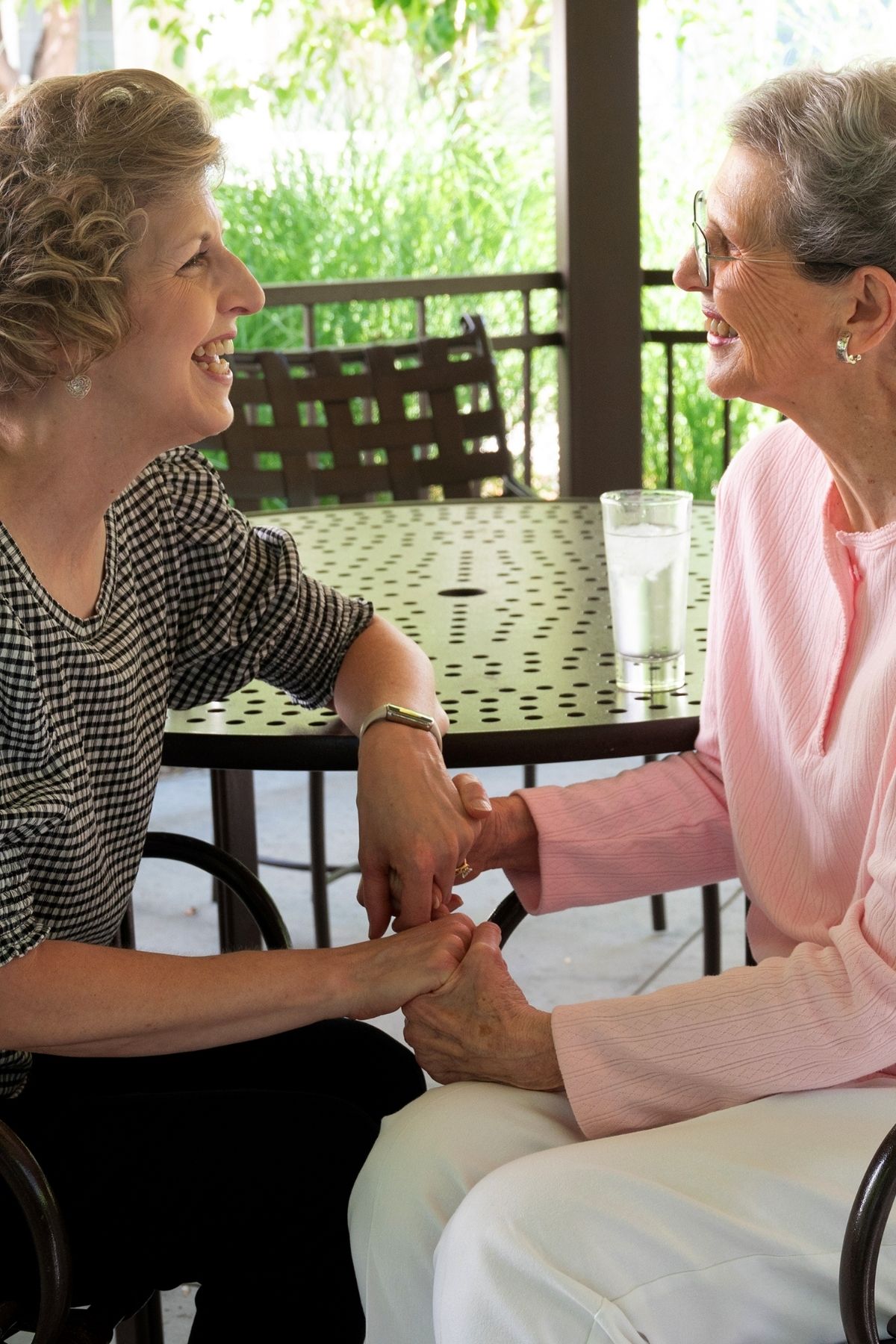 residents conversing outside portrait