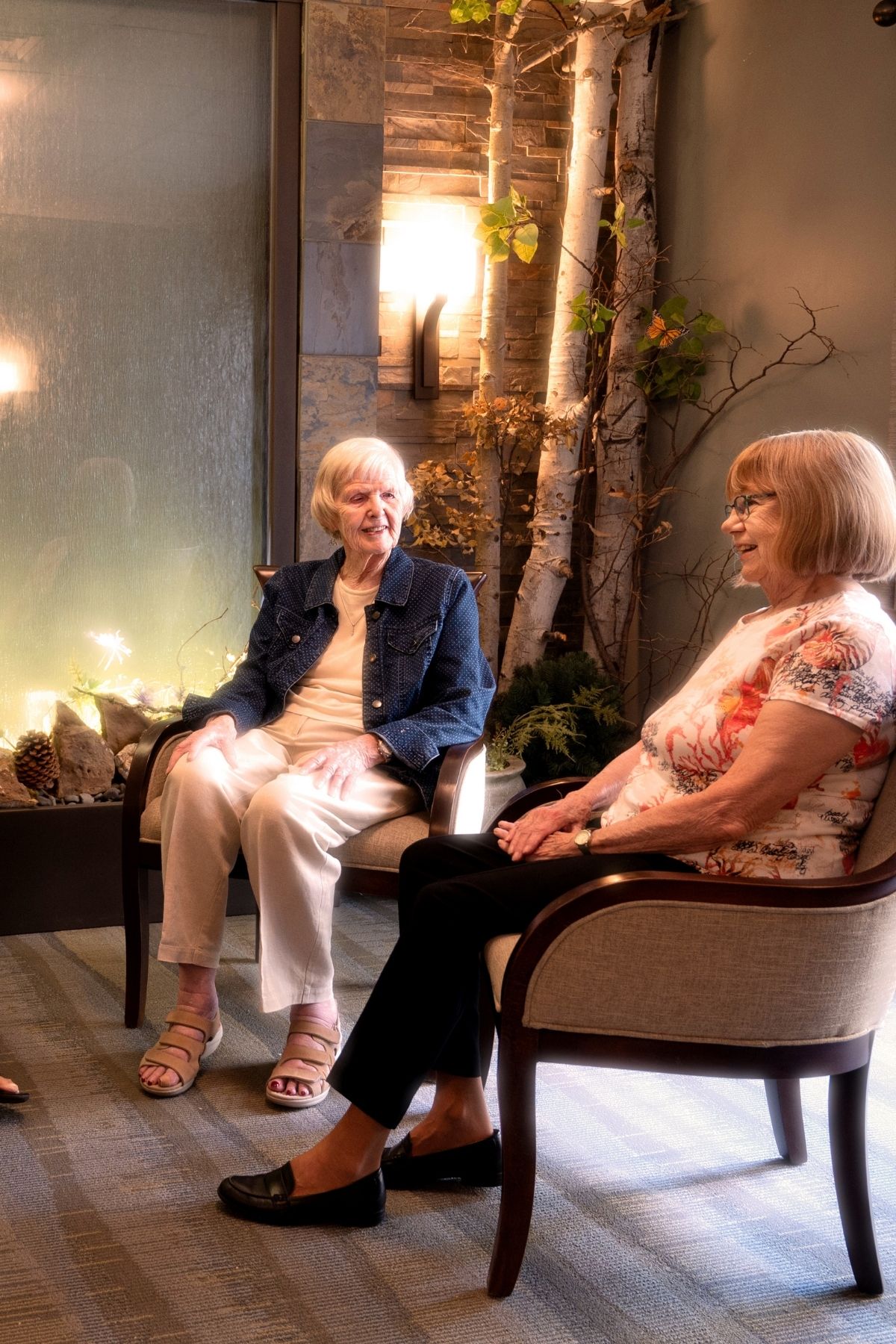 residents sitting around in lobby portrait