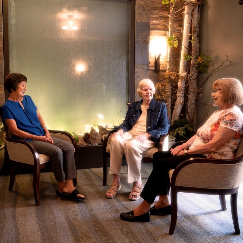 residents sitting in lobby square