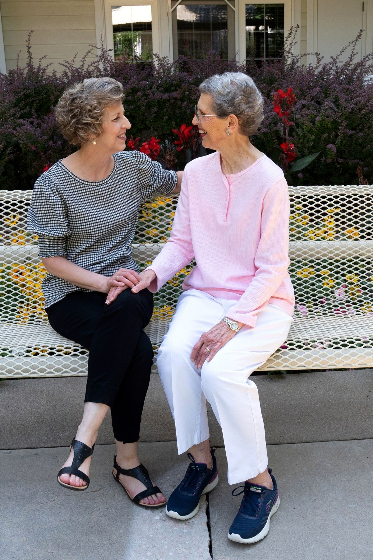 residents talking on bench portrait