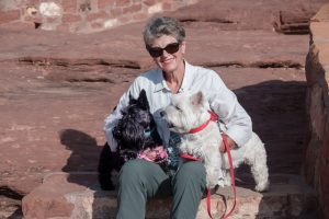 Pat Neel, with the couple's two dogs.