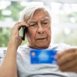 holly creek man addressing credit card fraud on phone