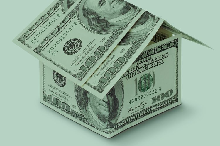 one hundred dollar bills folded into the shape of a house one hundred dollar bills folded into the shape of a house