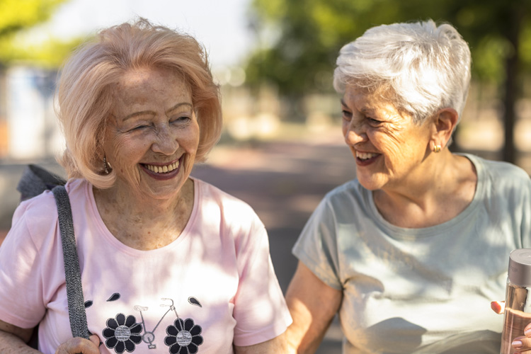 two senior women talking