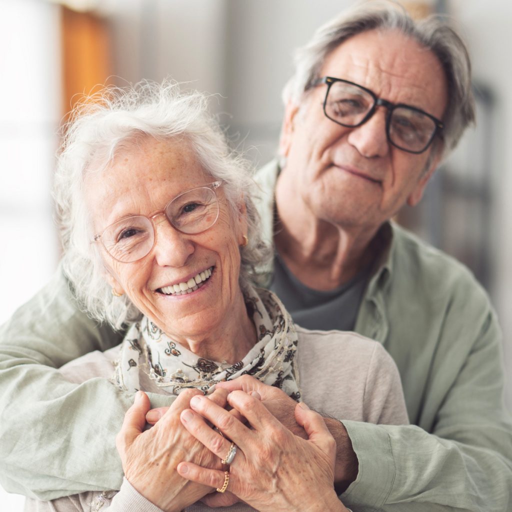 holly creek smiling senior couple